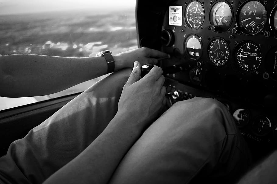 plane, cockpit, pilot, fly, one person, hand, human hand, human body part, real people, vehicle interior