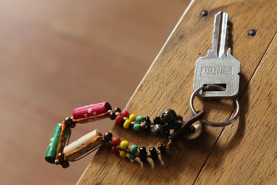 gray, sentry, key, multicolored, keychain, brown, wooden, surface, keyring, chain