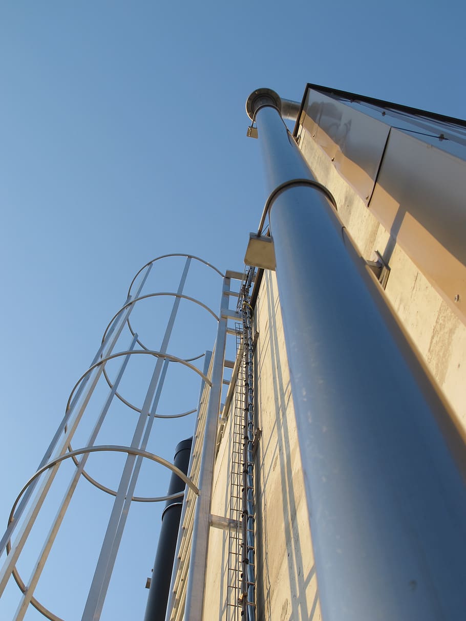sewage treatment, hose, factory, low angle view, sky, blue, nature, clear sky, metal, architecture