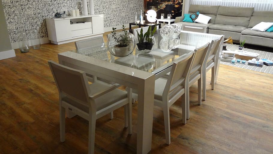 seven, white, wooden, chairs, clear, glass table, gray, fabric sofa, dining table, dining room