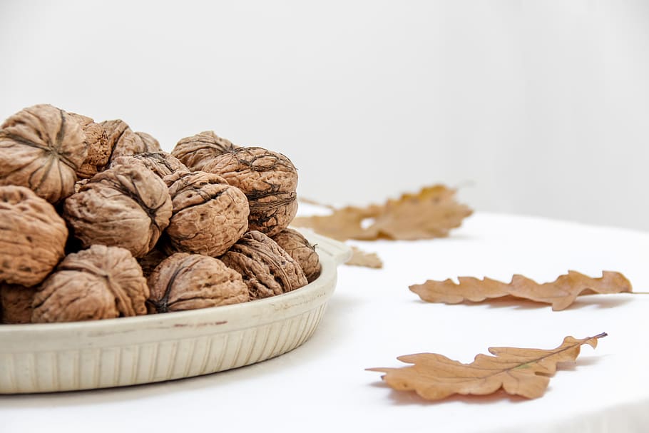 walnuts, plate, table, leaves, oak, close up, healthy, snack, diet, nuts