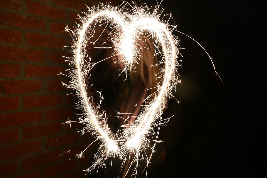 yellow, sparks, forming, heart, the heart of, old and new, asterisks, dark, shutter speed, move