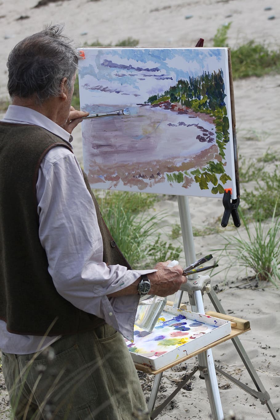 artist, painting, outdoors, close-up, seascape, one person, holding, occupation, paintbrush, brush