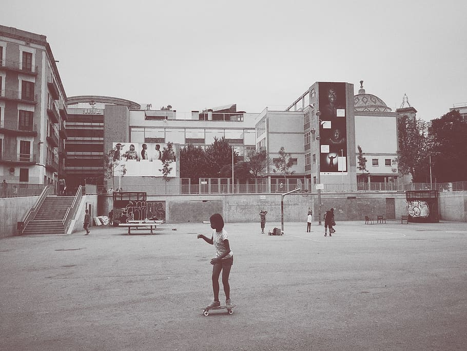 girl riding skateboard, skateboarding, park, skating, basketball, playground, architecture, building exterior, built structure, city