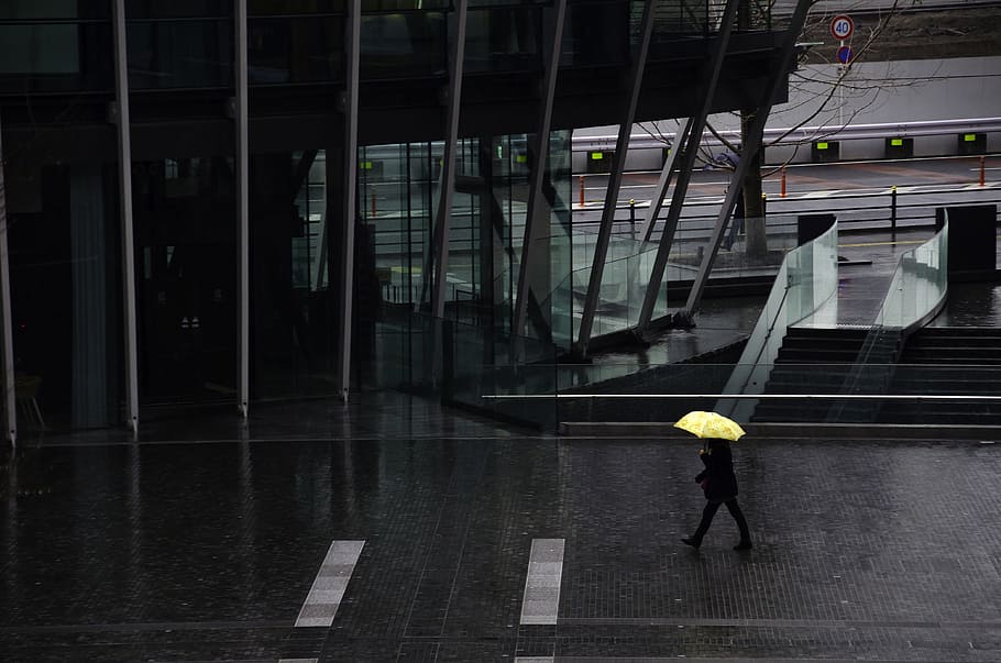 person, walking, street, holding, yellow, umbrella, raining, walking on, pedestrian, rain