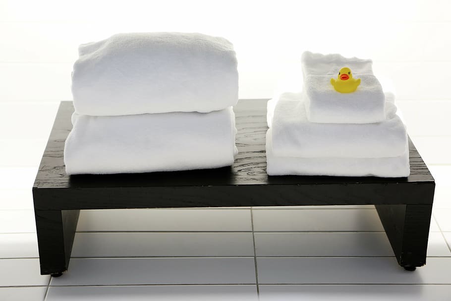 white, textiles, black, wooden, table, yellow, rubber, duck, towels, spa