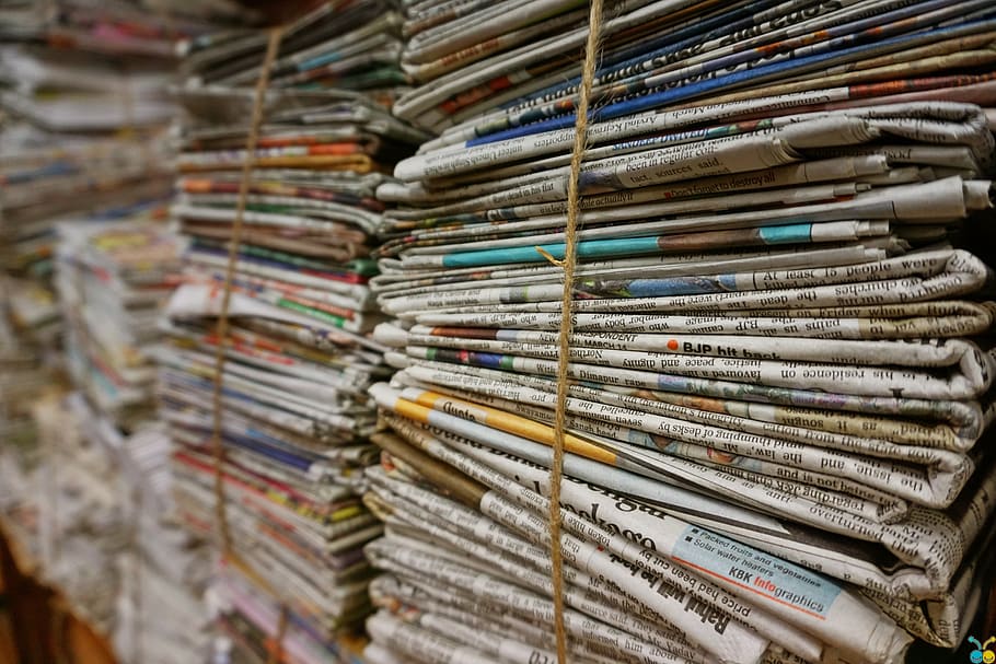 bundle, newspaper lot, jute rope, newspaper, old newspaper, stack, large group of objects, industry, store, indoors