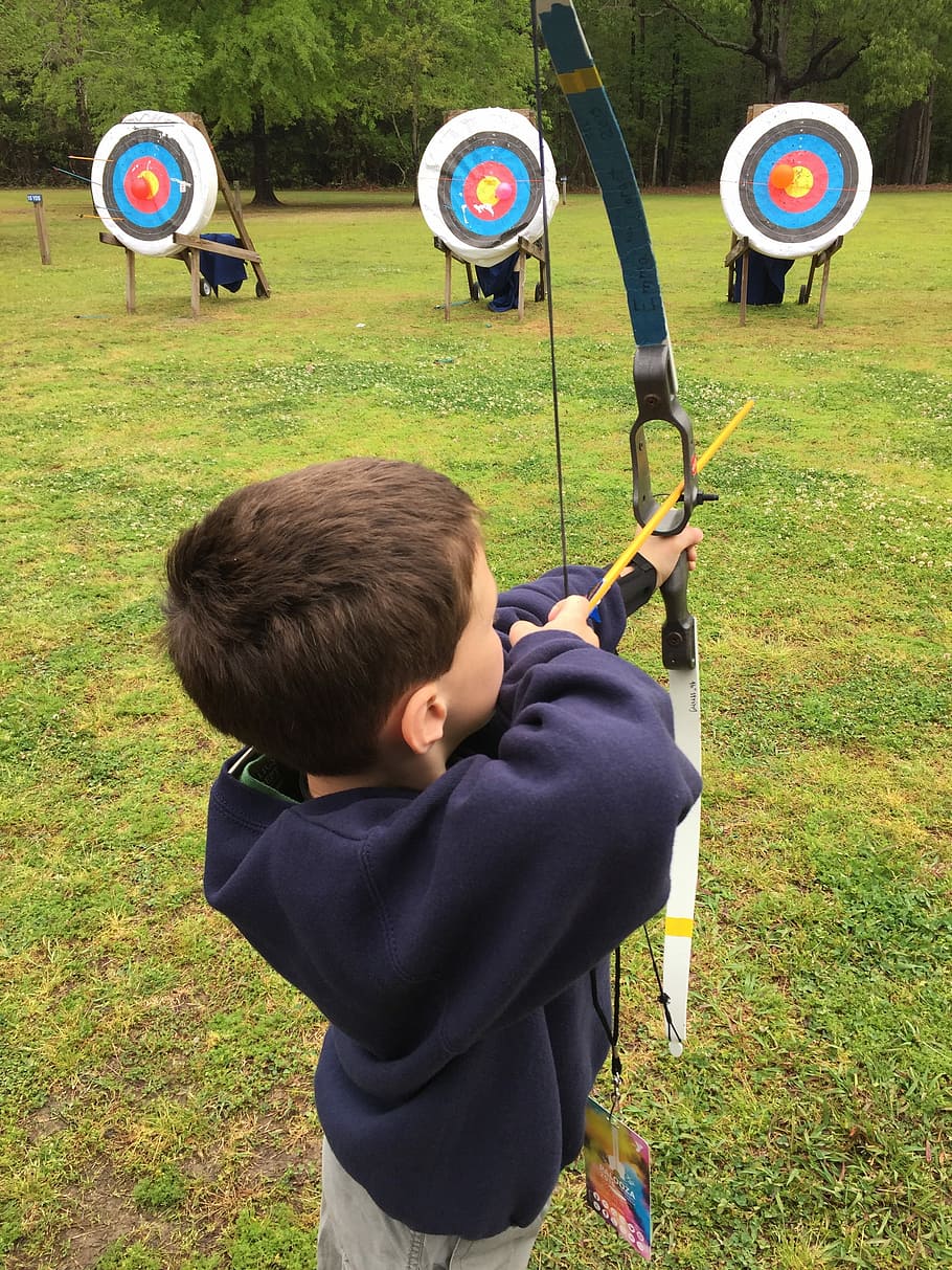 using, composite, aiming, target, green, grass, daytime, Archery, Boy, Bow