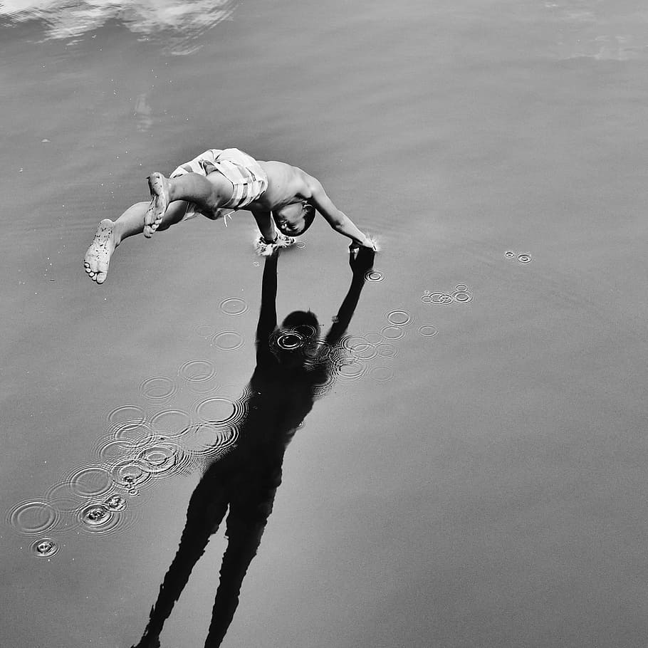 grayscale photography, person, diving, water, touch of your shadow, jump into the water, touch, full length, outdoors, day