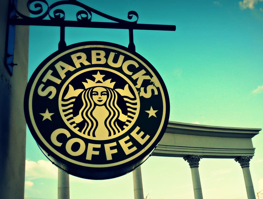starbucks coffee signage, hanging, daytime, starbucks, coffee, abstract, logo, sign, low angle view, architecture