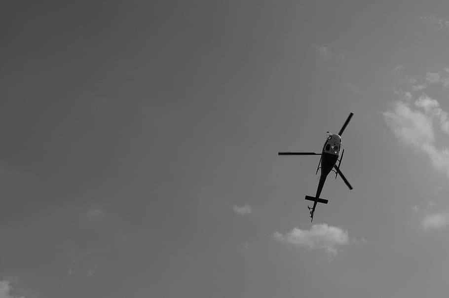 grayscale of helicopter, helicopter, chopper, aviation, aircraft, fly, flying, grey, sky, low angle view
