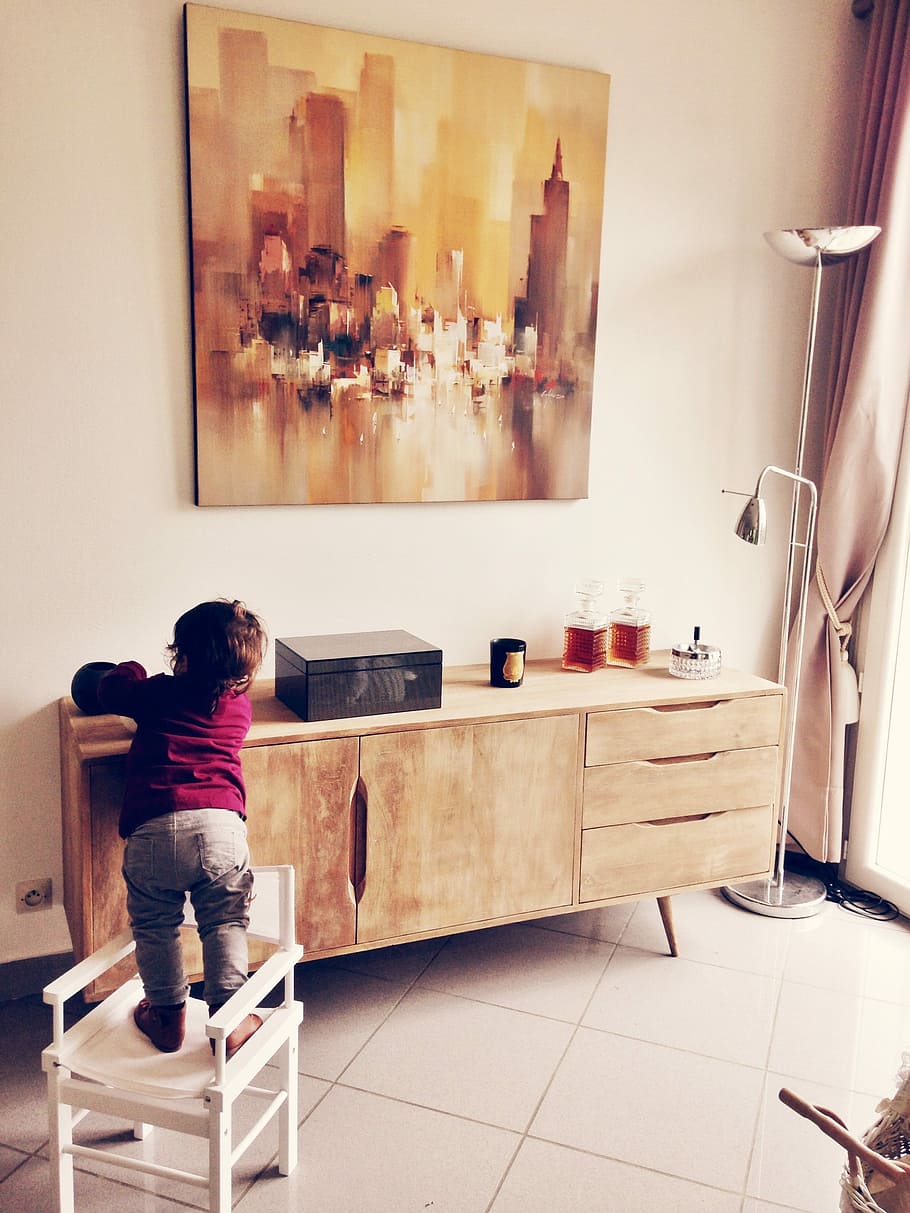 child, standing, white, wooden, armchair, front, sideboard, foolishness, living room, table