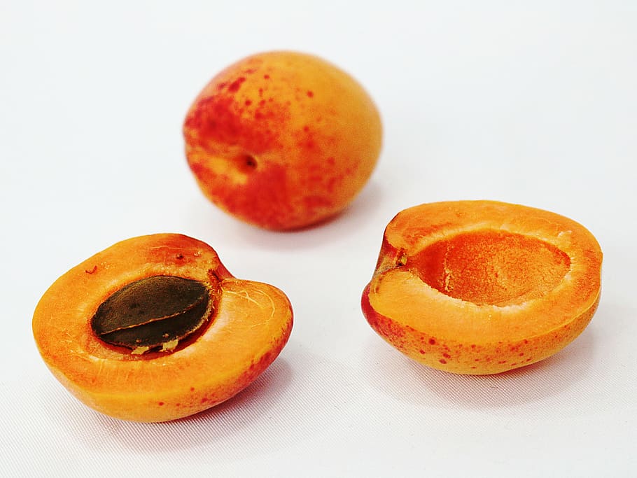 sliced peach fruit, fruit, apricot, apricots, integers, cup, kernel, food and drink, food, freshness