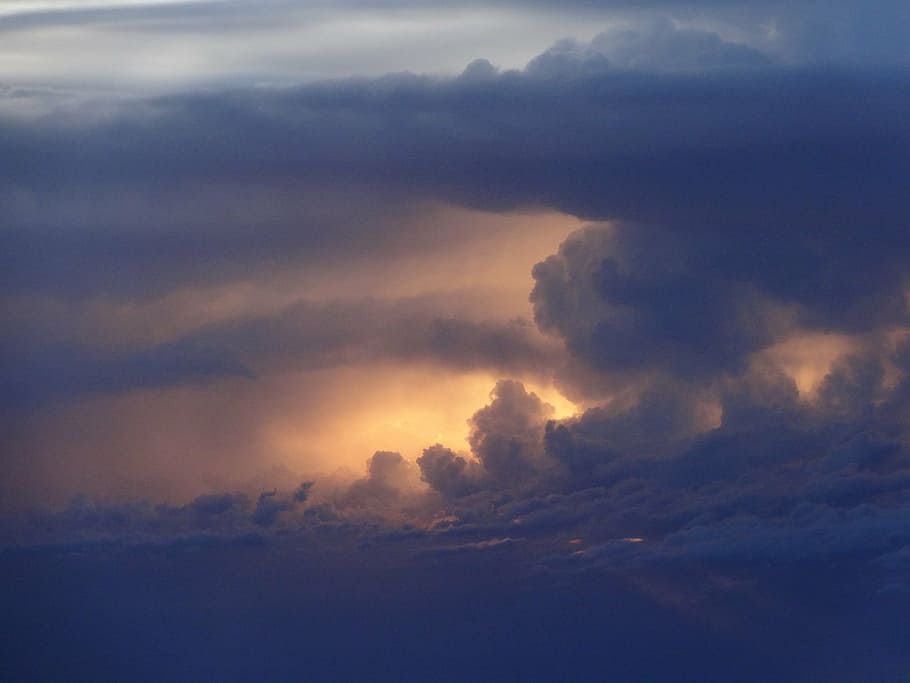 low-angle photo, clouds, cumulonimbus, storm, sunset, sky, sky clouds, cloud sky, glowing, cloudscape