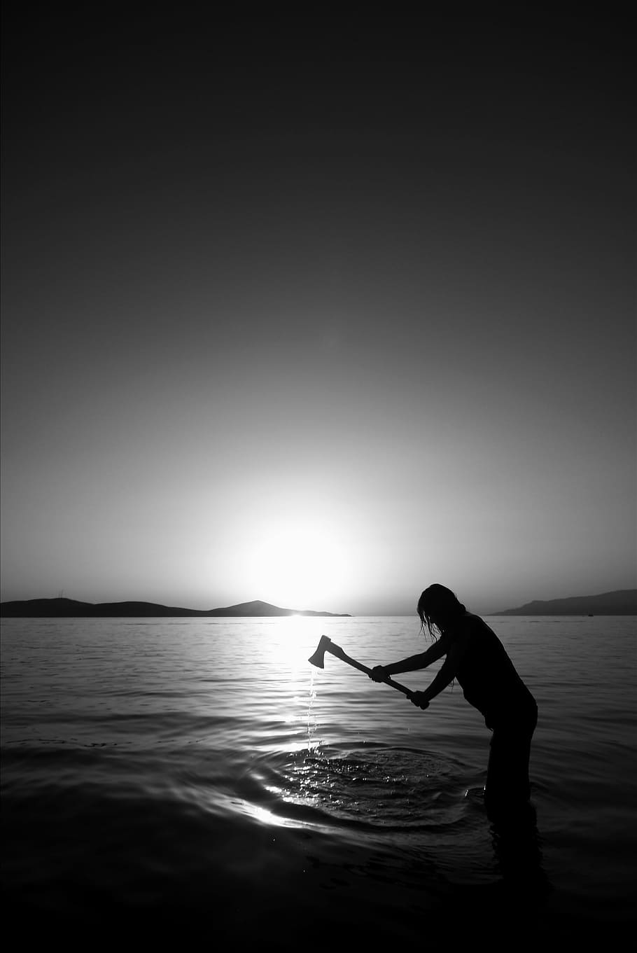silhouette photo, person, holding, axe, body, water, black and white, model, marine, portrait