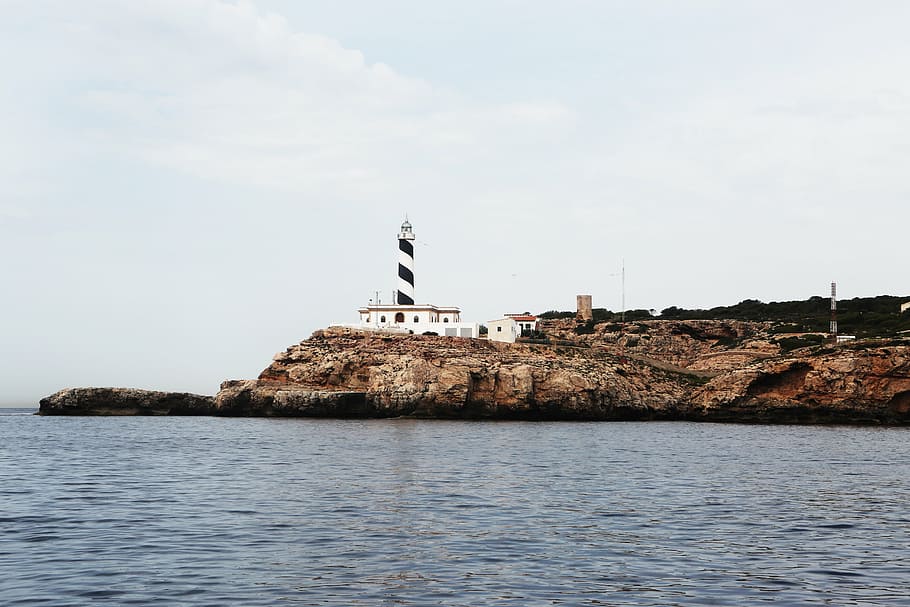 lighthouse, cloudy, sky, white, black, near, body, water, coast, sea
