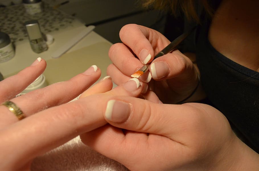 person doing manicure, fingernails, frechnails, nail design, hands, human hand, human body part, hand, body part, two people