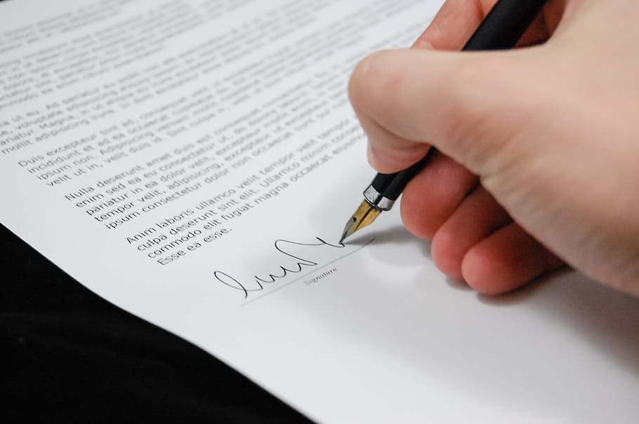 person, holding, black, fountain pen, document, agreement, documents, sign, business, paper