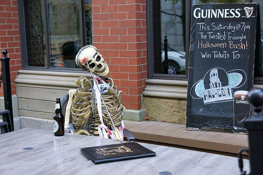 skeleton, sitting, chair, menu board, storefront, dead, bar, halloween, addiction, alcohol