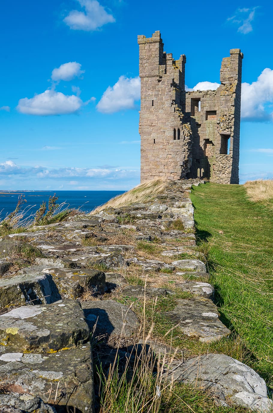 dunstanburgh castle, ruin, tower, castle, middle ages, sky, stone, historically, england, places of interest