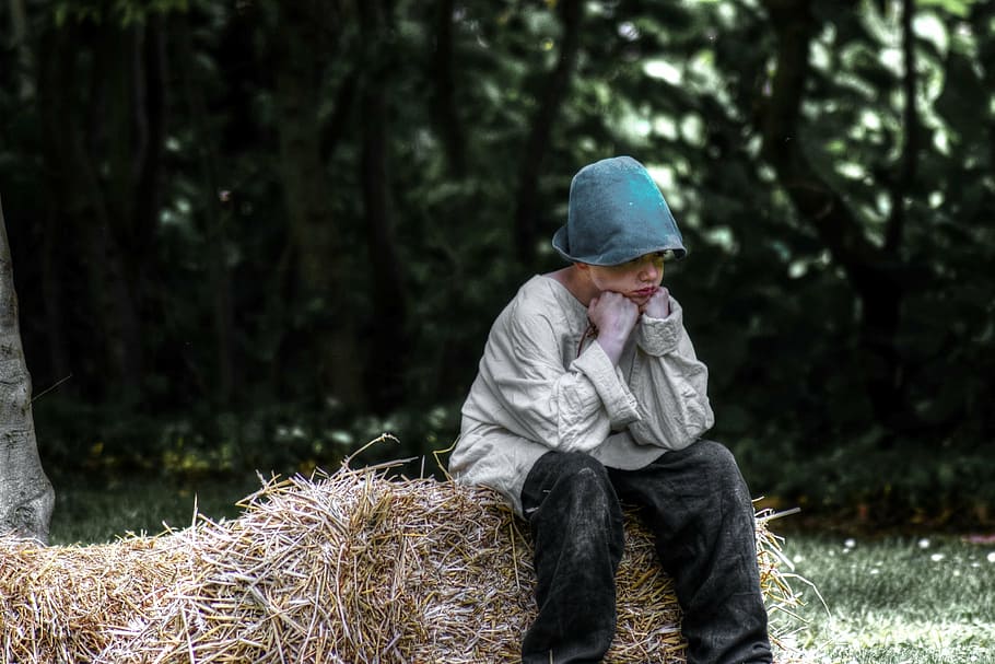 boy, sitting, hay feeling, sad, outdoor, angry, child, evil, plant, tree