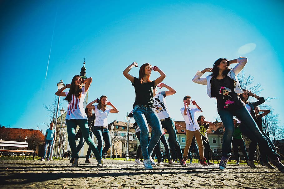 group, people dancing, open, field, daytime, dancing, girls, young, disco, party