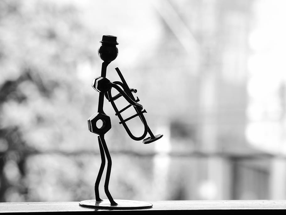 person, black, metal figure, musician, trumpet, metal, snowman, table decoration, garnish, statue