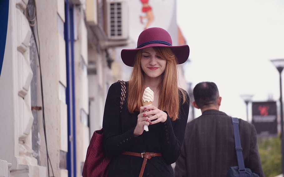 woman, wearing, sun hat, holding, ice cream, building, woman with ice-cream, girl, lady, ice
