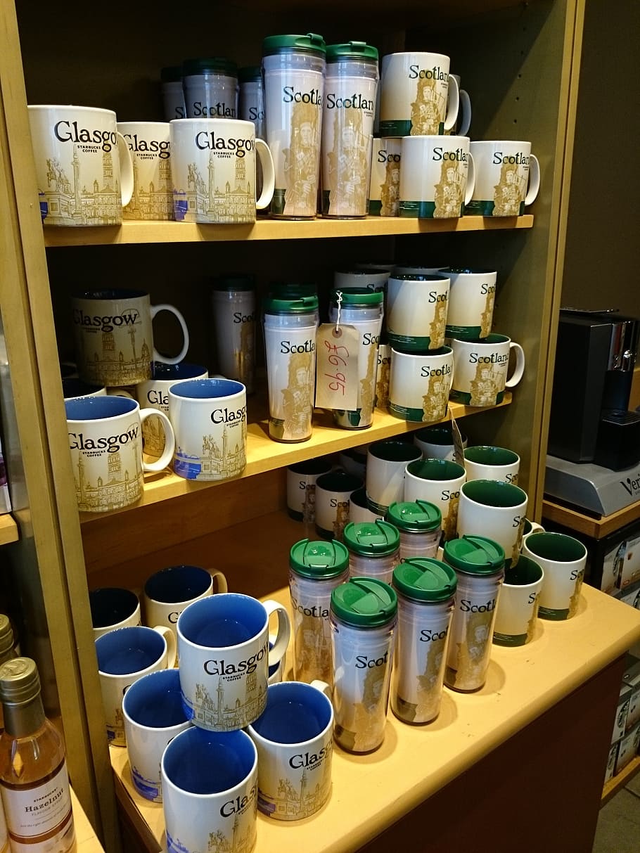 cup, starbucks, frame, shelf, large group of objects, container, choice, indoors, variation, still life