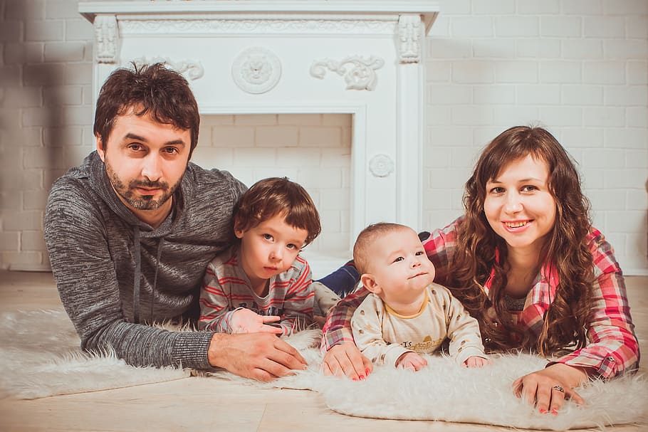 woman, man, holding, toddlers, lying, rug, family, family photo shoot, parents with children, family photo | Pxfuel