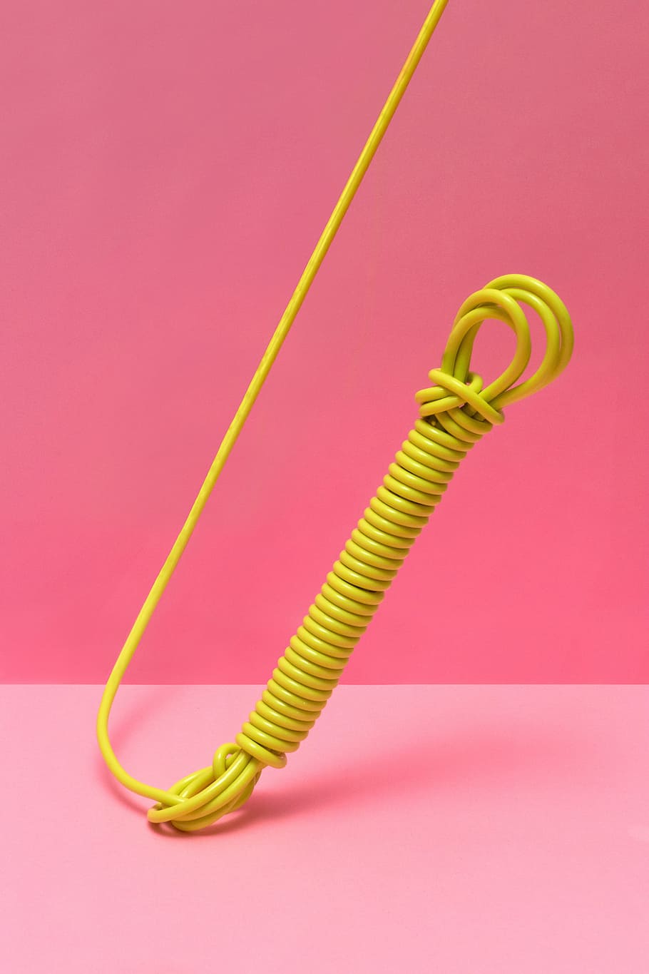 pink, background, yellow, wire, colored background, studio shot, cable, single object, pink background, indoors