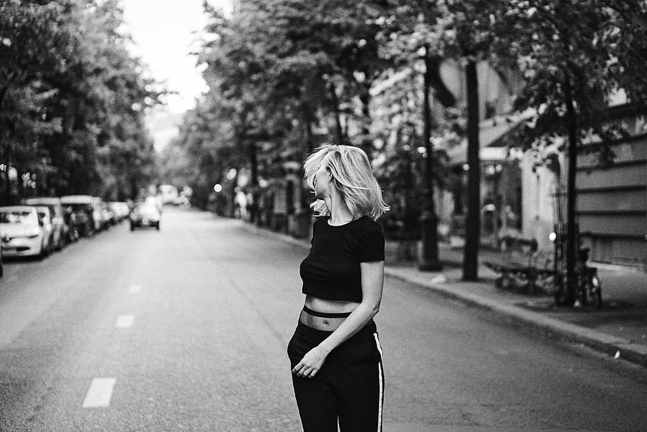 grayscale photo, woman, walking, streets, people, girl, alone, road, street, car