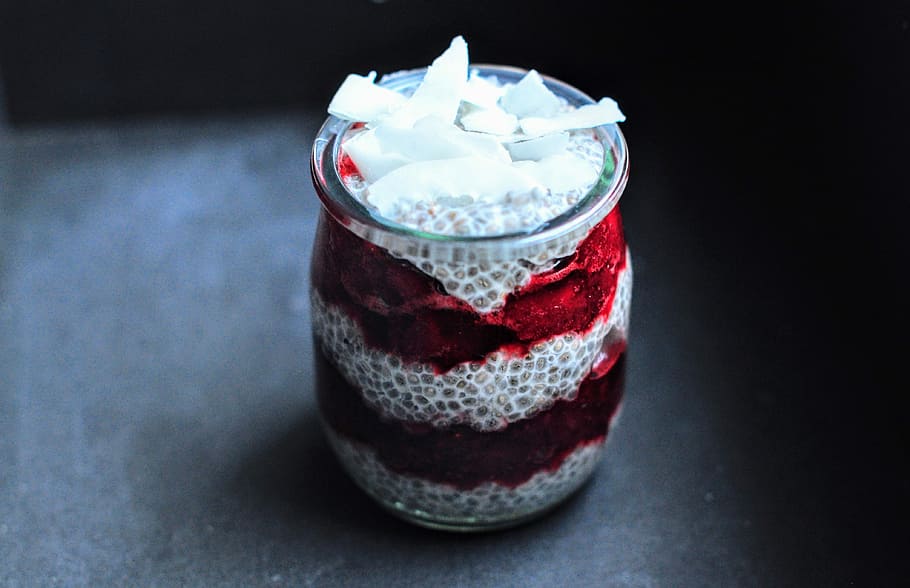 white, red, votive, candle, close-up photography, votive candle, chia, pudding chia strawberries coconut, ice, drink