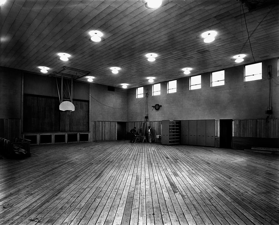studio grayscale photo, oak ridge, tennessee, 1940s, black and white, gym, gymnasium, floor, lights, lighting