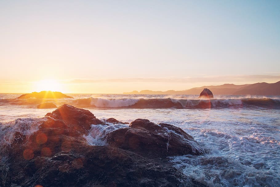sea waves, crushing, rocks, sea, waves, near, rock, formation, sunset, sunlight