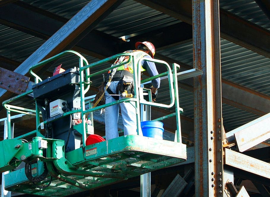 person, safety suit, green, lifter machine, daytime, worker, construction, factory, hard hat, tool belt