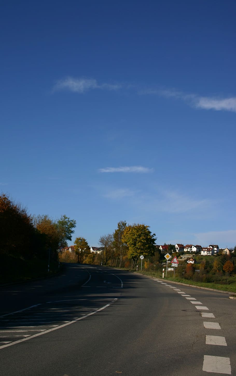 road, curve, curvy, place, village, small town, sky, blue, asphalt, traffic