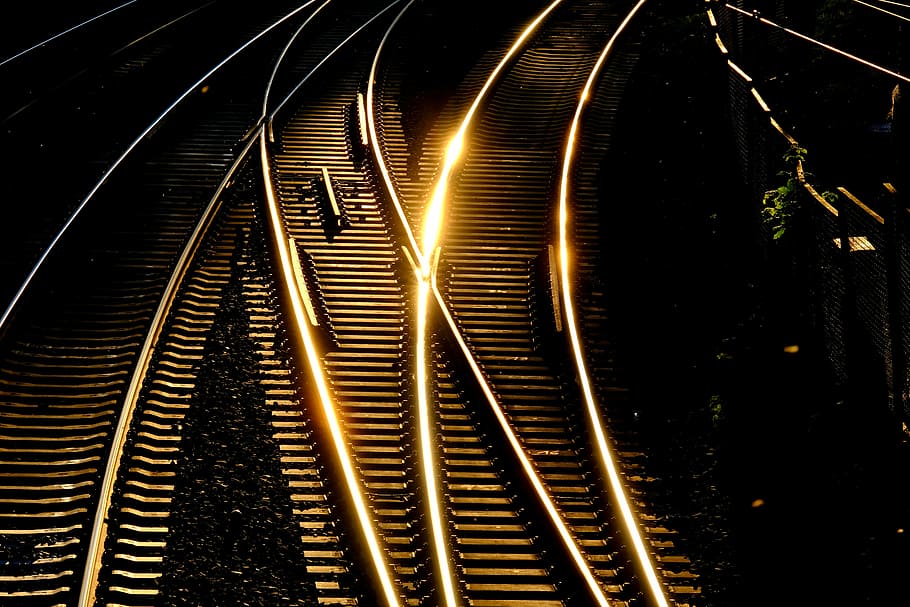 stainless, steel train, tracks, sunset, gleise, glow, sun, light, ray of light, mood
