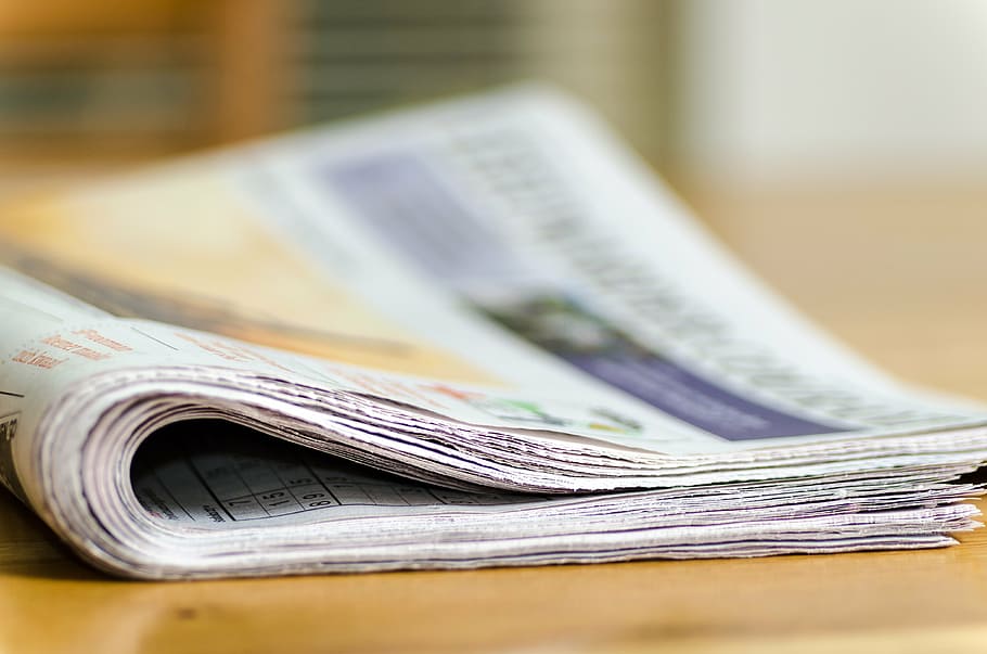 folded newspaper, newspapers, leeuwarder courant, press, news, daily newspaper, currency, business, finance, close-up