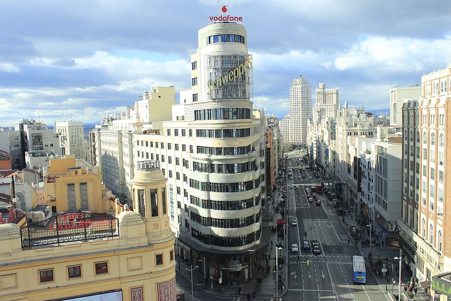 town square, daytime, gran vía, madrid, spain, city centre, great way, building exterior, built structure, architecture