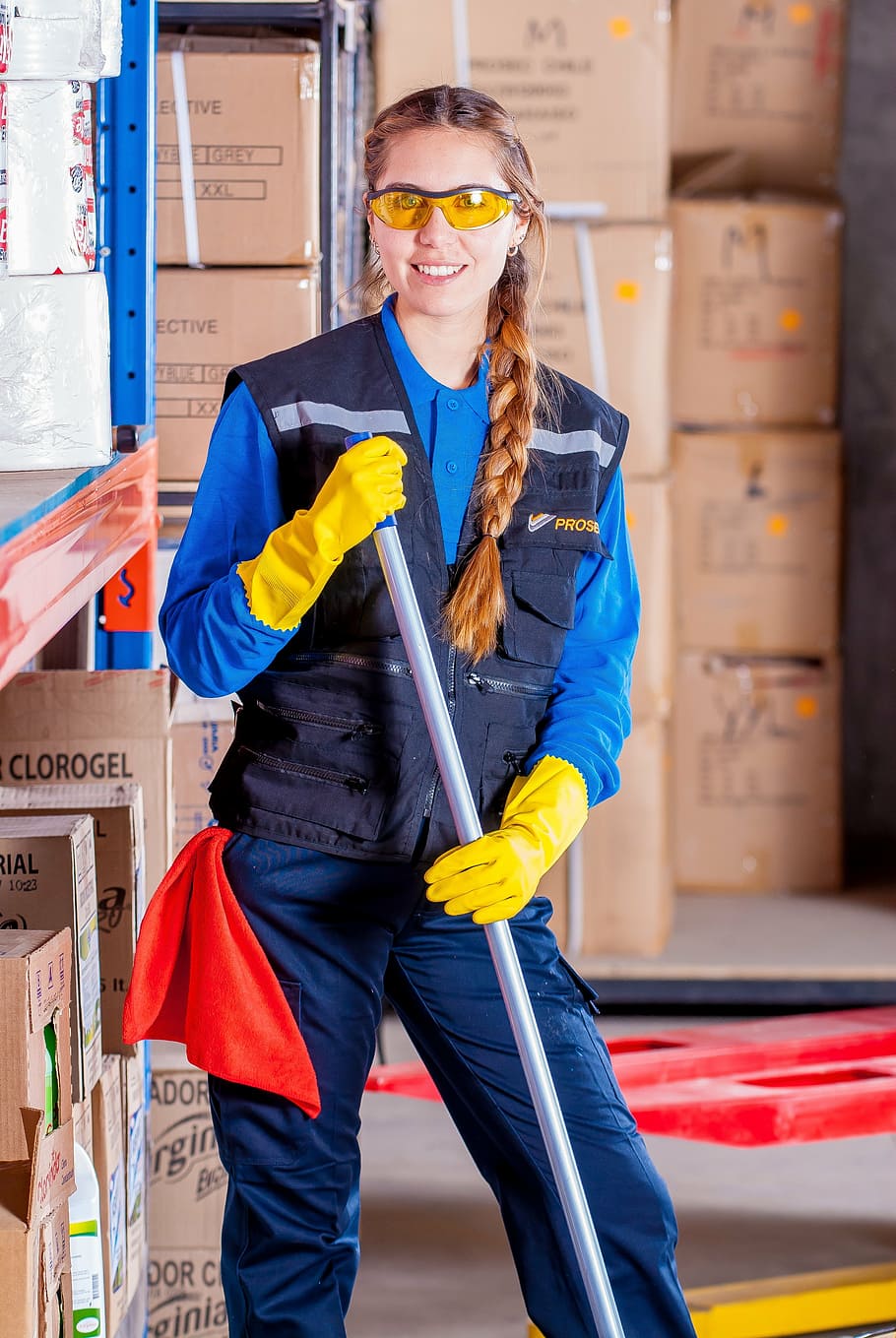 woman, blue, vest, wearing, yellow, gloves, industrial, security, logistic, work clothes