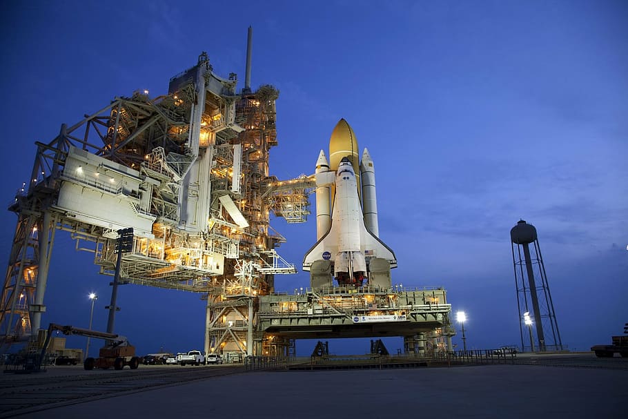 white, spaceship, night time, atlantis space shuttle, rollout, launch pad, pre-launch, astronaut, mission, exploration