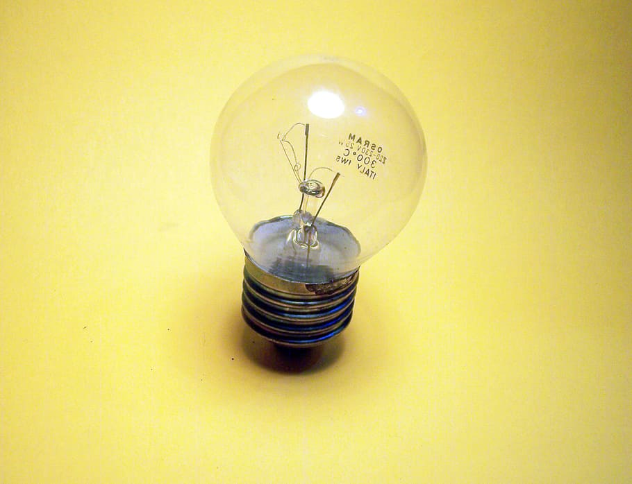 light, light bulb, yellow, lighting equipment, indoors, illuminated, electricity, electric light, wall - building feature, glowing