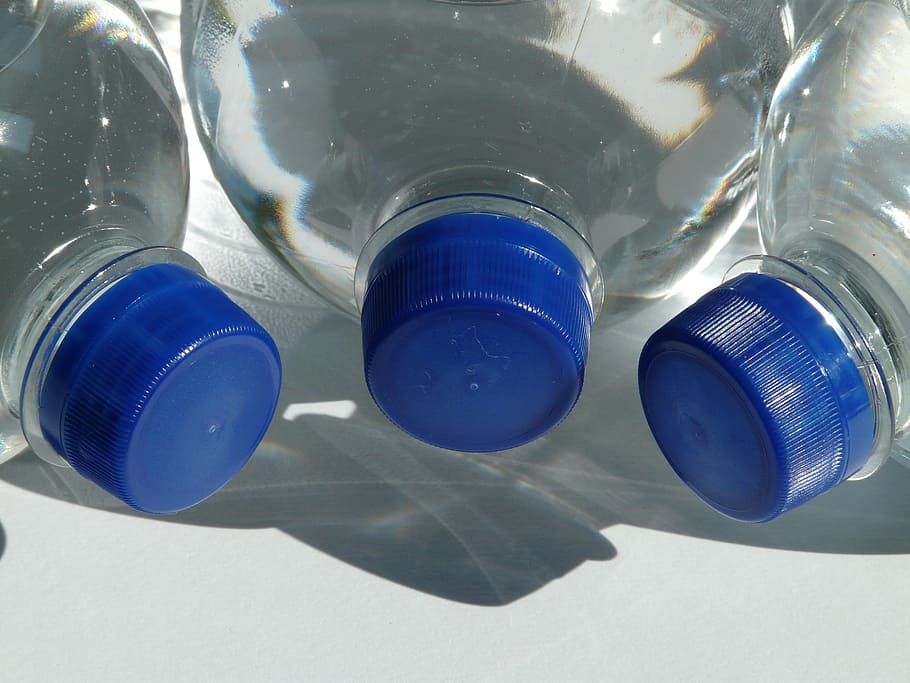three, closed, blue, clear, plastic bottles, bottles, plastic bottle, bottle, mineral water, water
