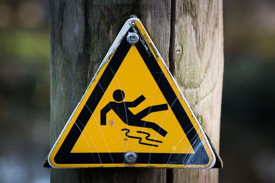slippery when wet, sign, hazard, yellow, triangle shape, warning sign, shape, warning symbol, communication, safety