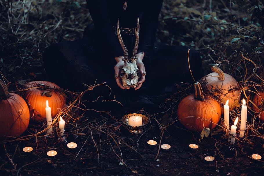 female, laying, floor, pumpkins, lighted, candles, candle, candlelight, creepy, dark