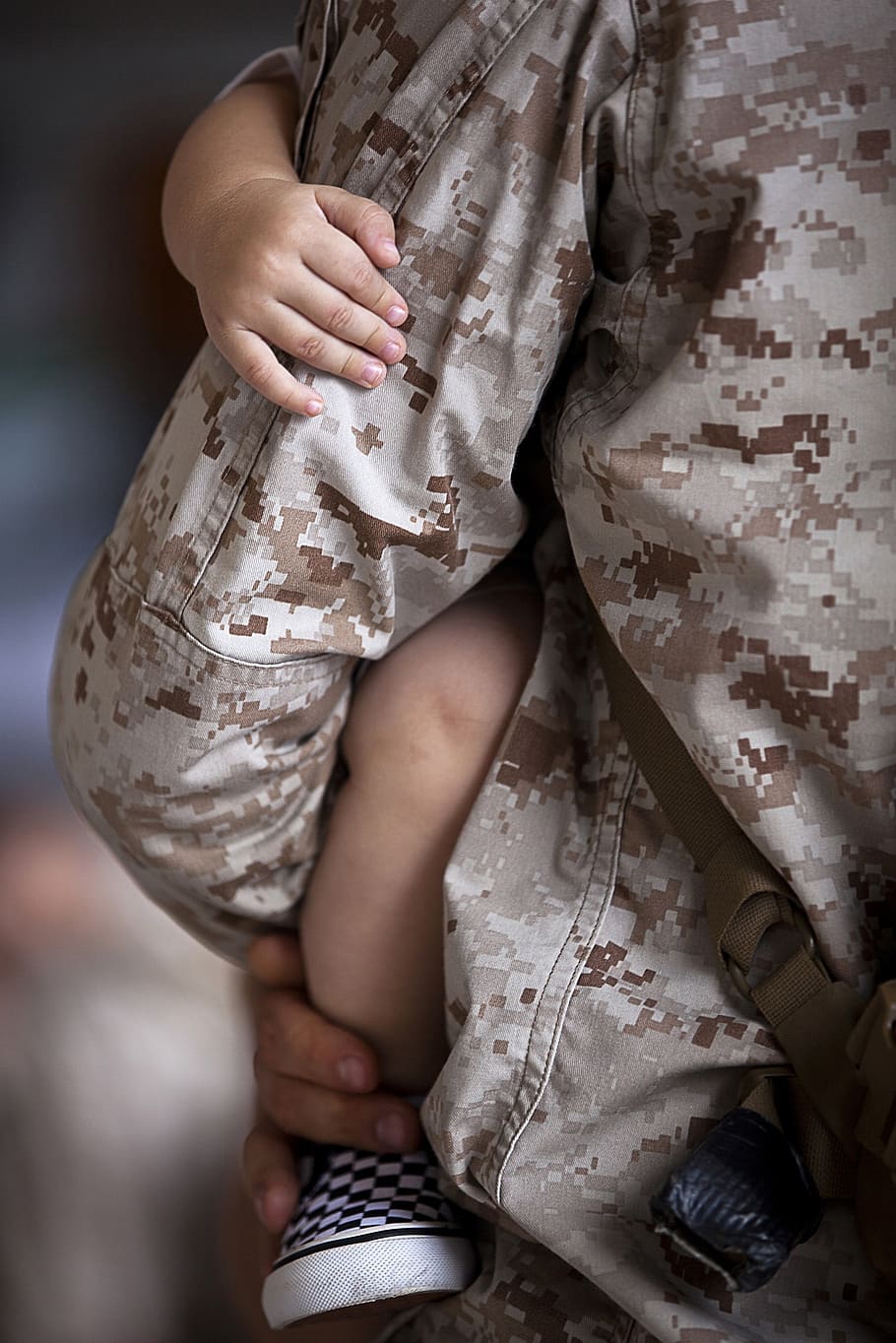 close, photograph, man, military, jacket, holding, baby, dad, son, carry