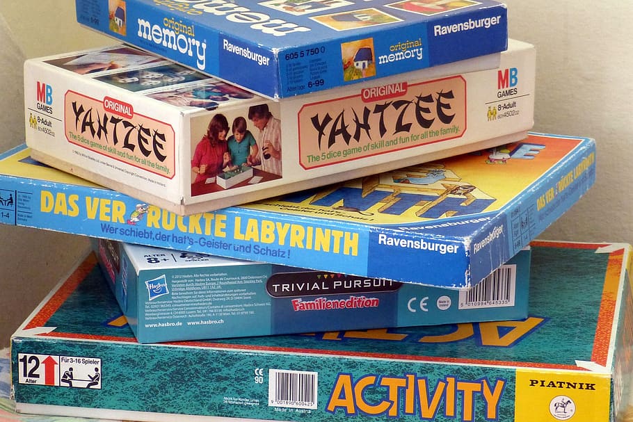stack, assorted-brand board game boxes, board games, games, gesellschaftsspiel, fun, entertainment, text, box, architecture