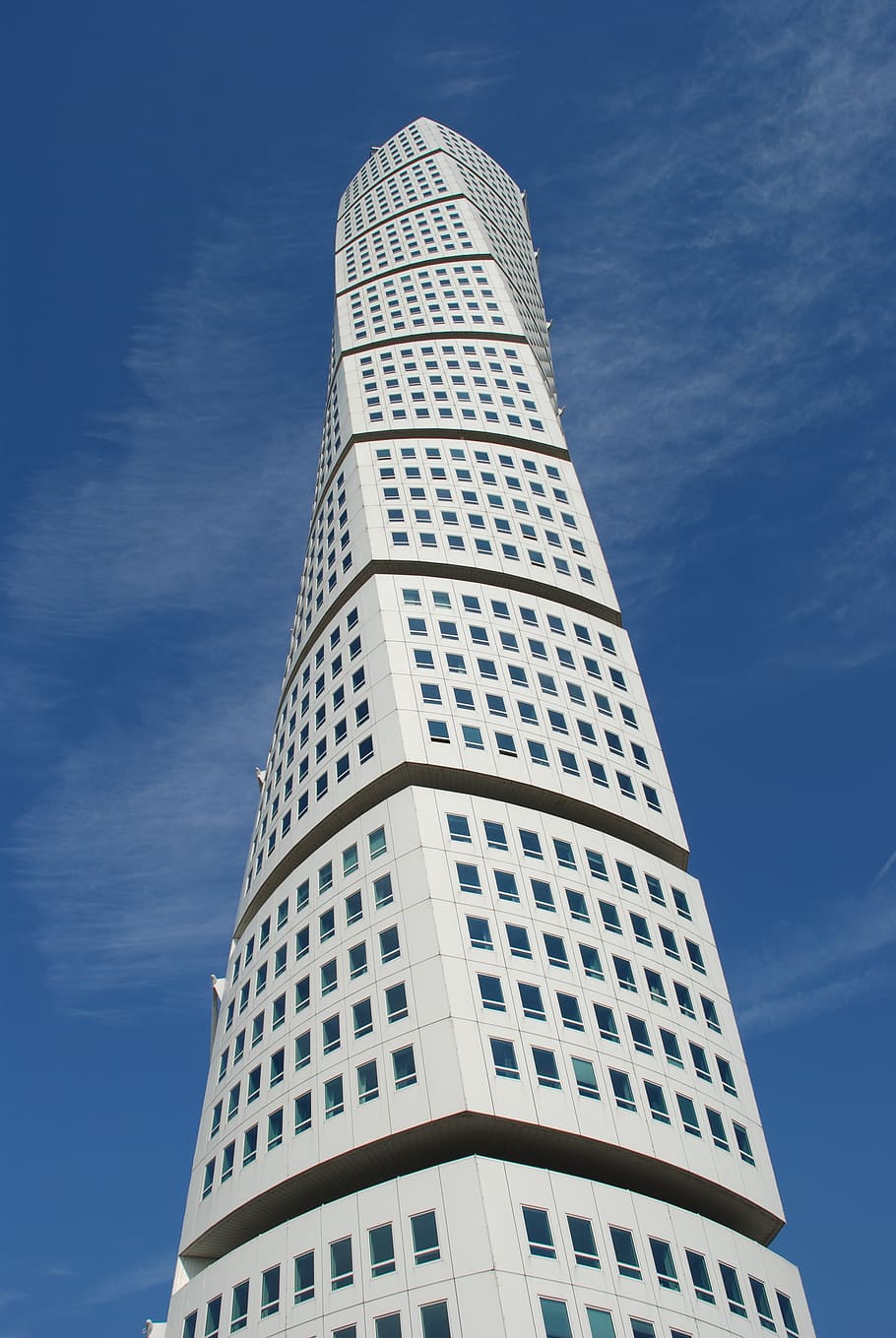 low-angle photo, white, concrete, building, malmö, skyscraper, architecture, skåne, turning, torso