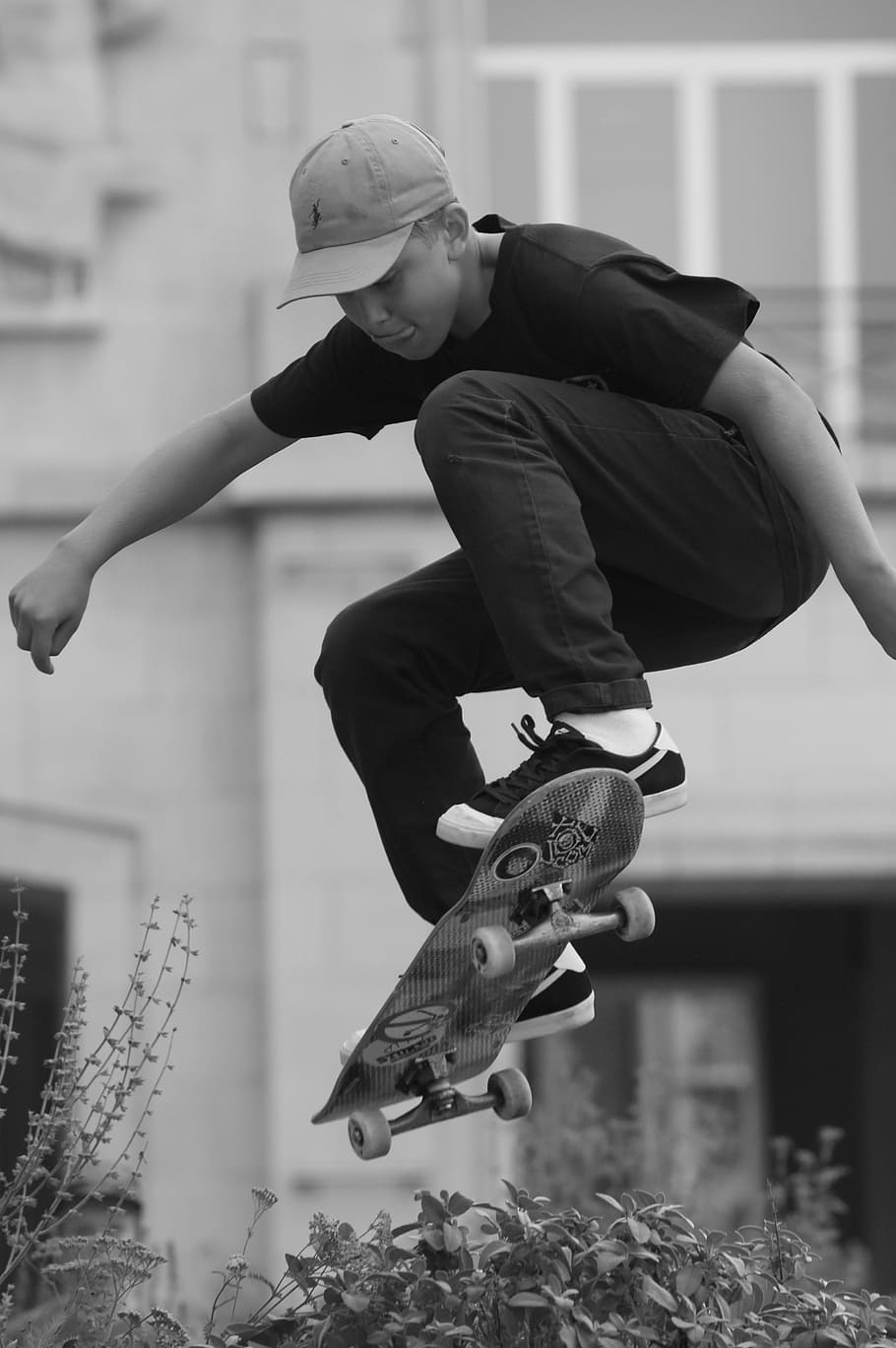 grayscale photography, man, playing, skateboard, skating, sports, people, pet, jump, skater